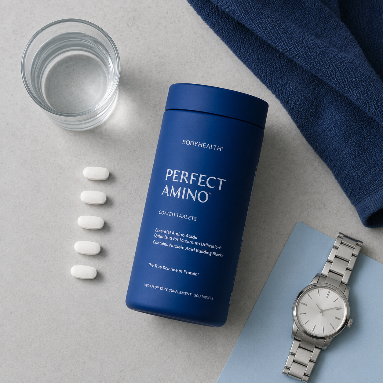 PerfectAmino morning flat lay with five tablets and water